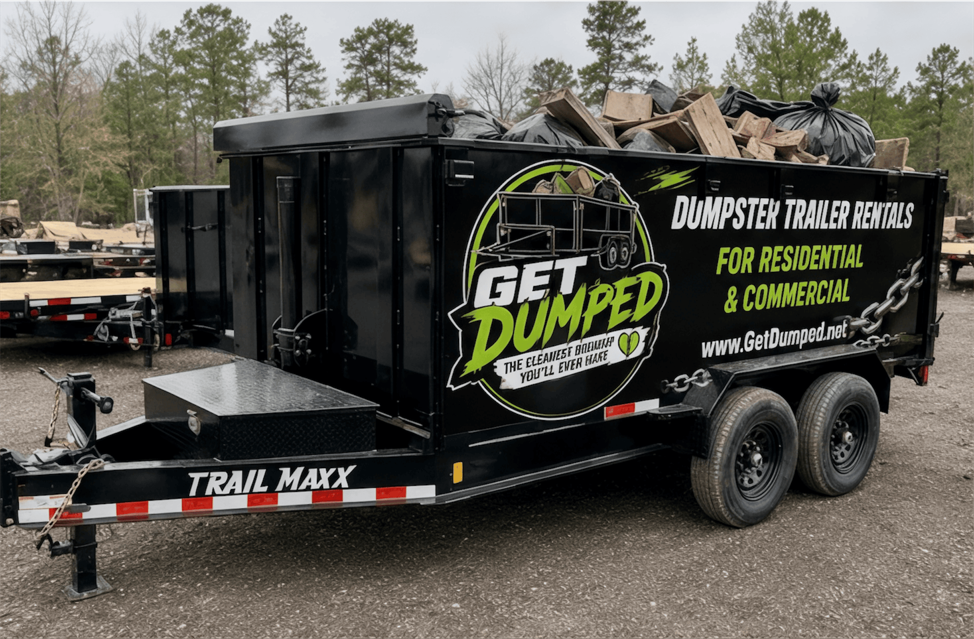 Black Get Dumped dumpster trailer with debris