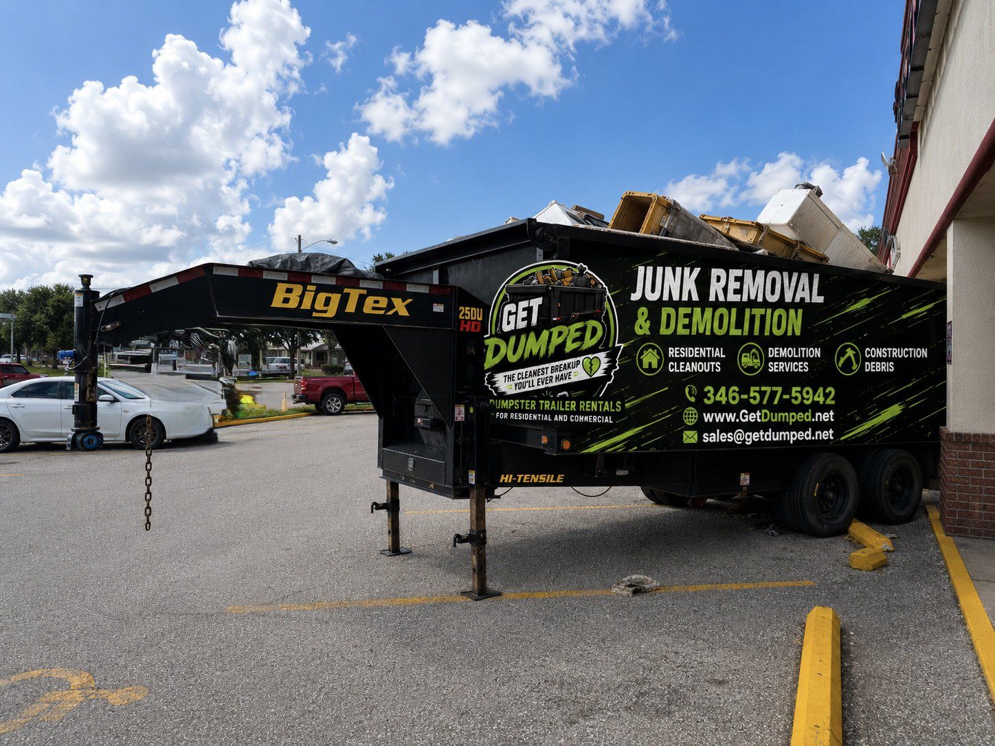 Get Dumped junk removal trailer parked outside