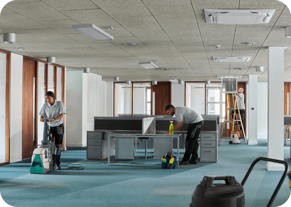 Office cleaning crew at work